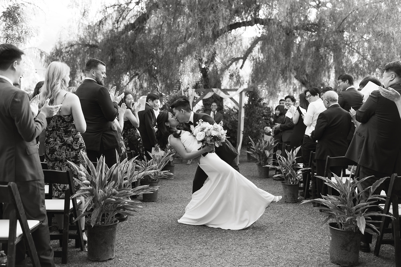 wedding the greenhouse pnoc orange county california bride and groom kiss wedding ceremony pictures musician live music