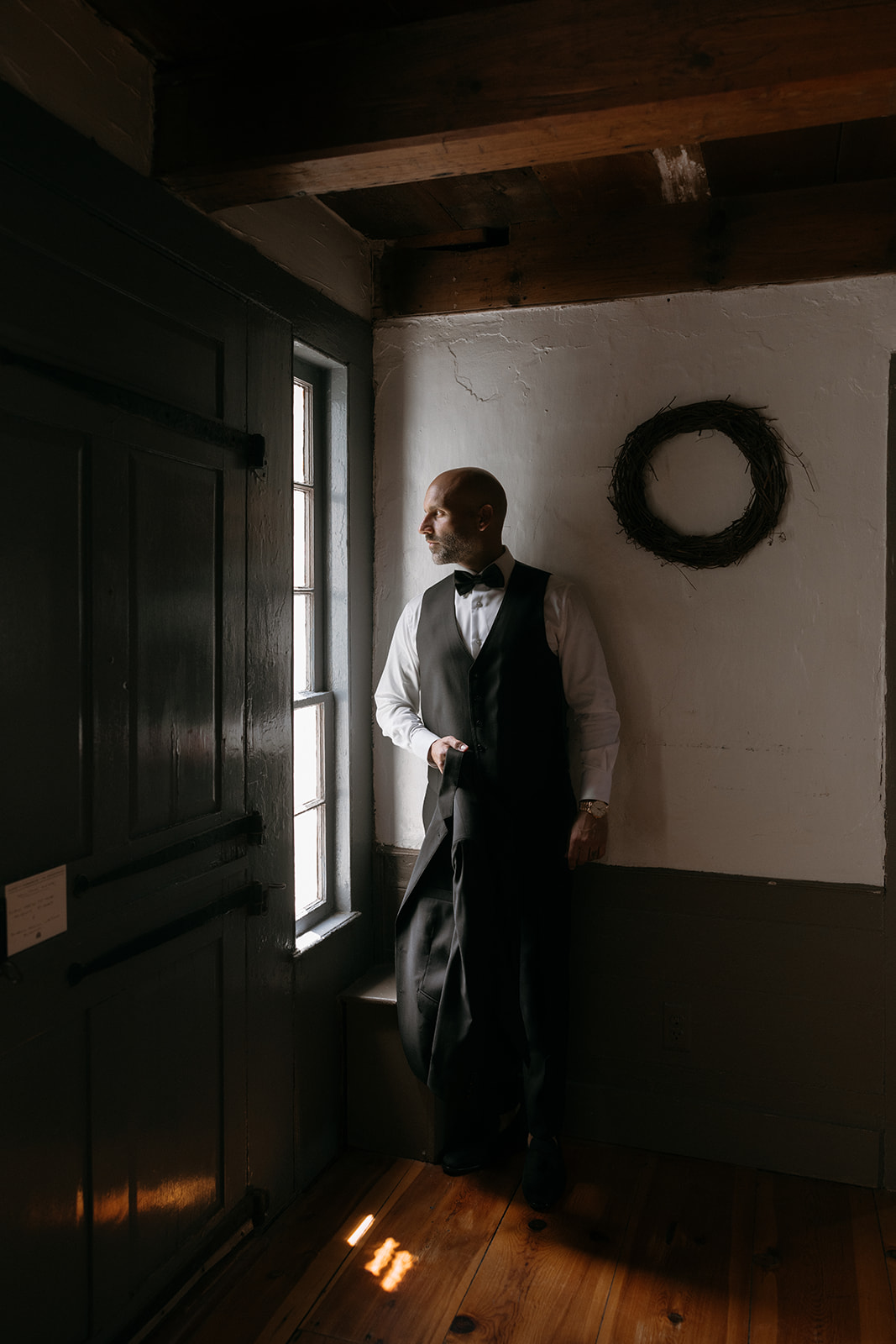 Groom getting ready for his wedding at one of the guest houses in Audrey's Farmhouse