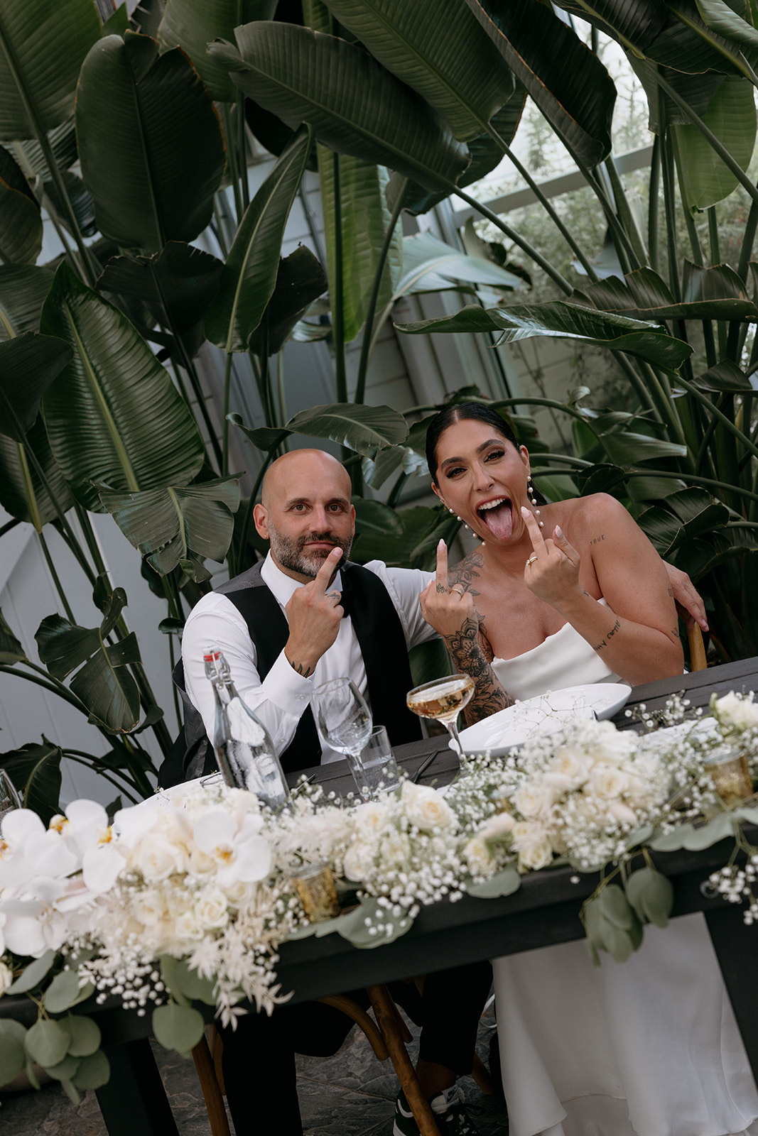Bride and Groom have fun during wedding reception