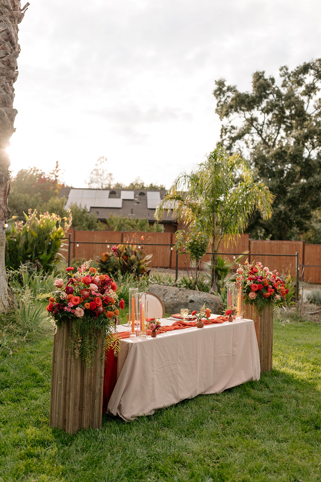 sacramento california backlyard wedding norcal bride and groom table red pink wedding flowers florals church wedding