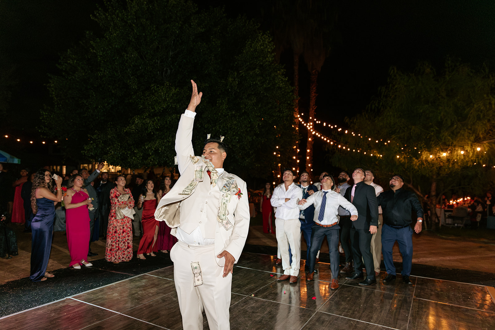 sacramento california backlyard wedding norcal bride throwing bouquet groom throwing soccer ball wedding tradition