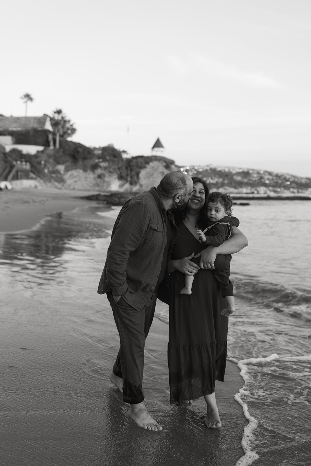 golden hour family session laguna beach california best beach photoshoot locations couples walking along beach candid