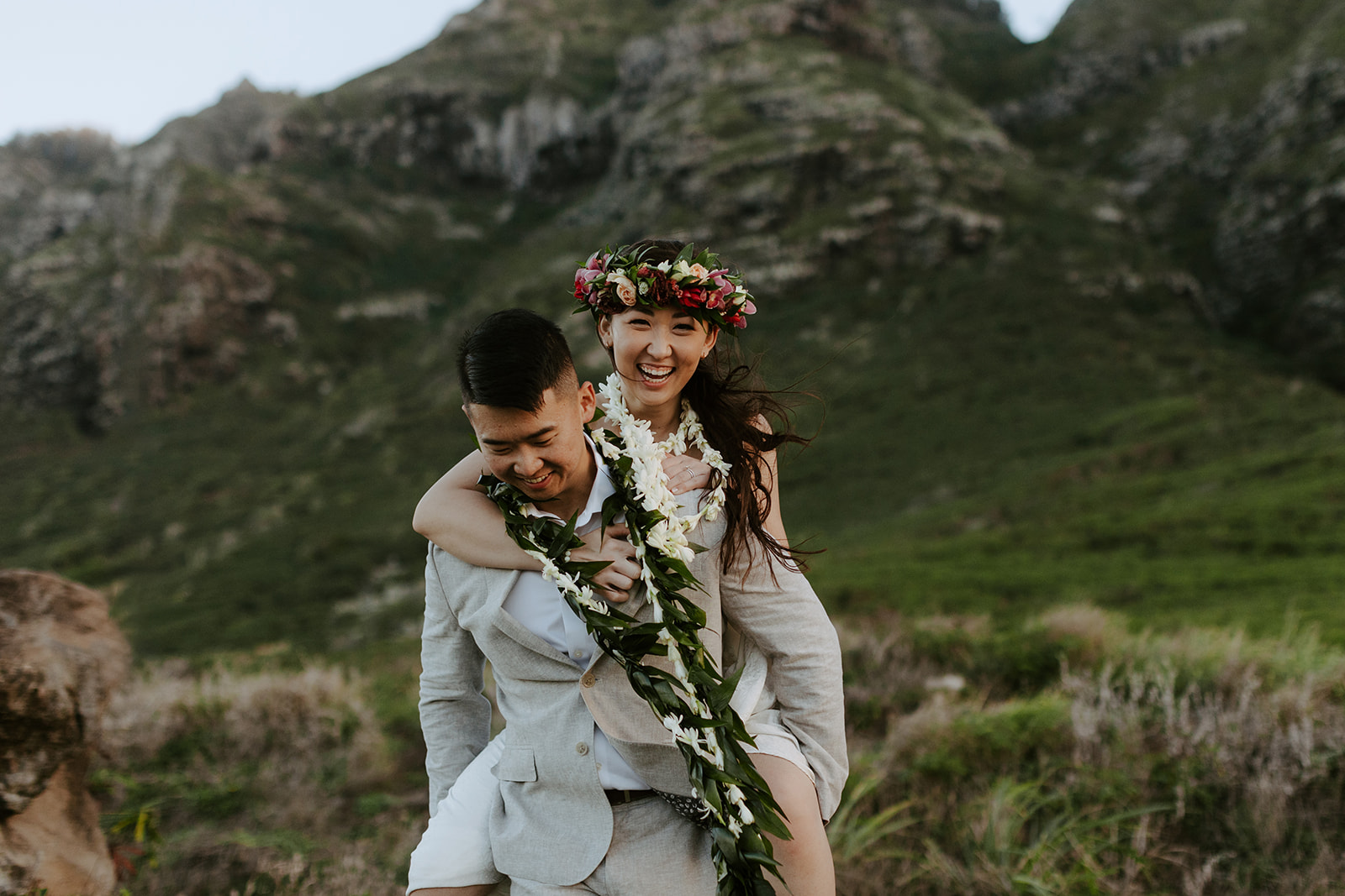 A couple who eloped on the North Shore of Oahu explore the mountains after getting married in Hawaii. 