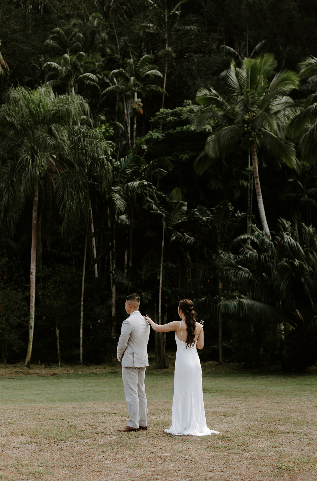 A couple who eloped on the North Shore of Oahu have a first look in the jungle before their Hawaii wedding. 