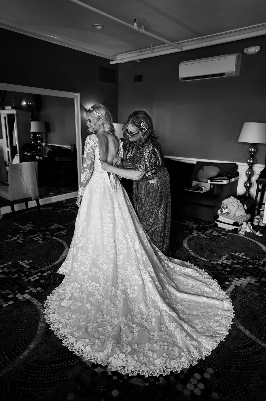 Chevy Chase Country Club Wedding Photo - beautiful bride getting ready, zipping up dress