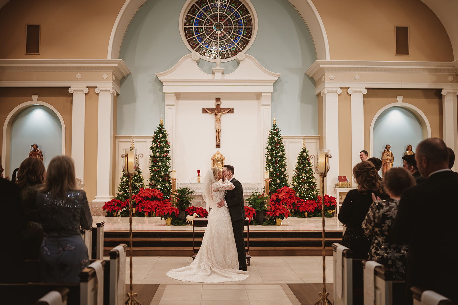 Chevy Chase Country Club Wedding Photo - ceremony in St James Catholic Church first kiss