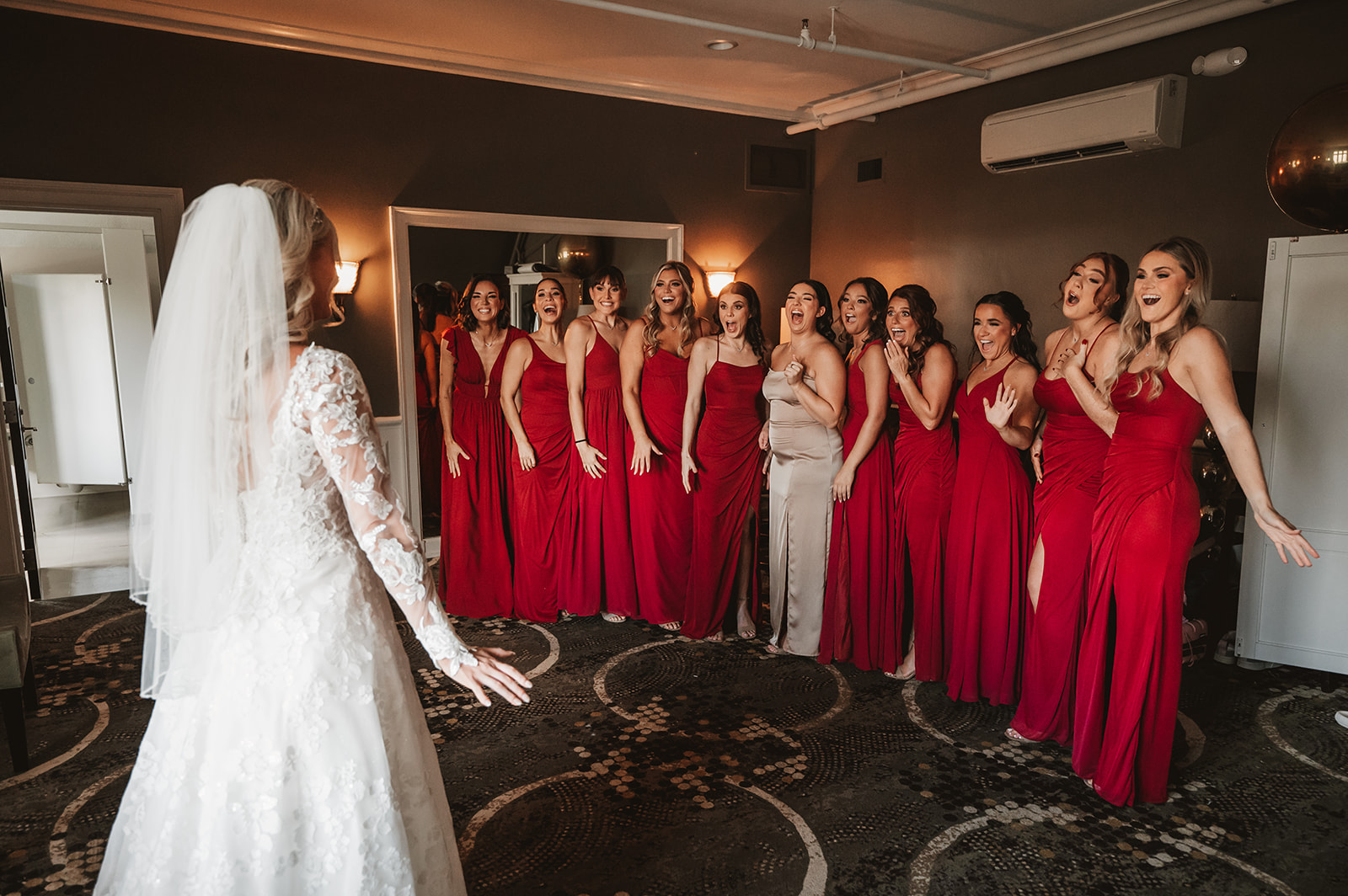 Chevy Chase Country Club Wedding Photo -bridesmaids first look with the beautiful bride 