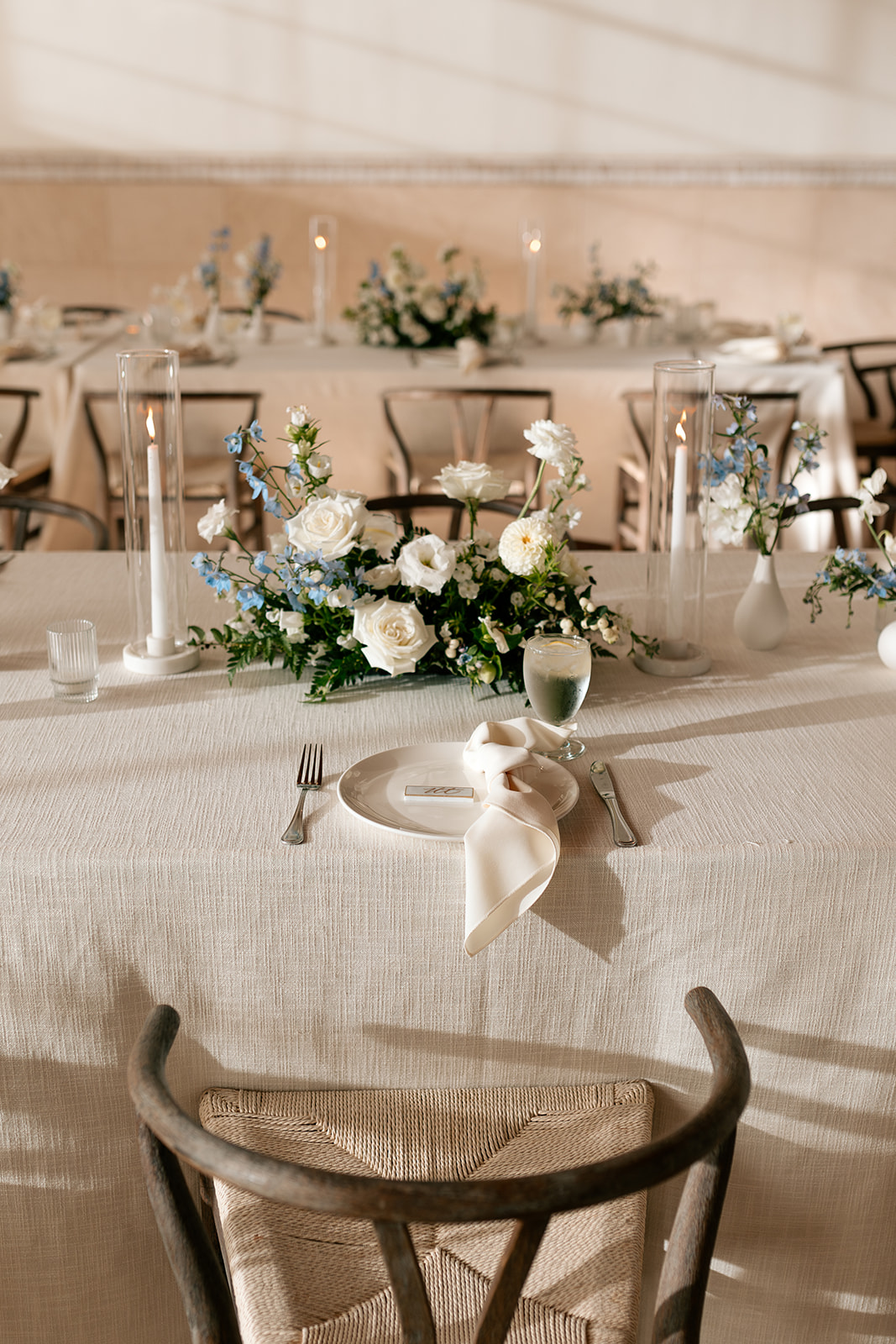 grand gimeno wedding orange county california indoor reception ballroom reception wedding arch indoor white tables