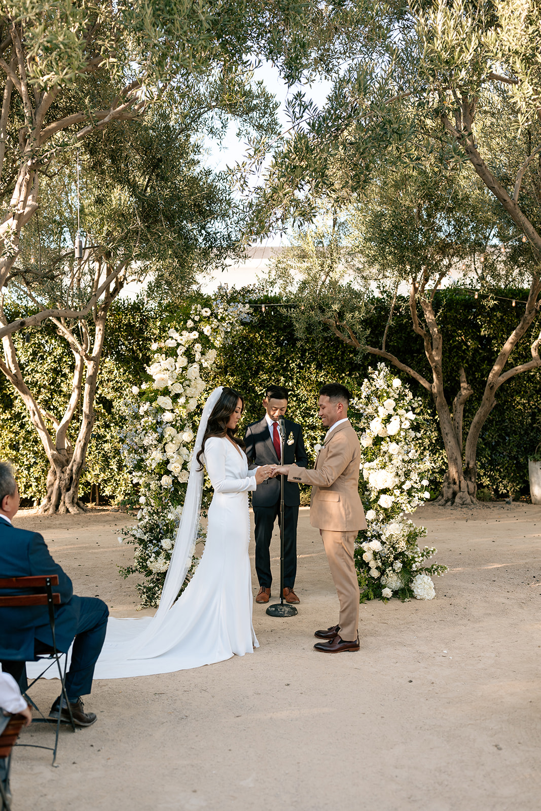 grand gimeno wedding orange county california outdoor backyard wedding ceremony bride and groom ceremony pictures