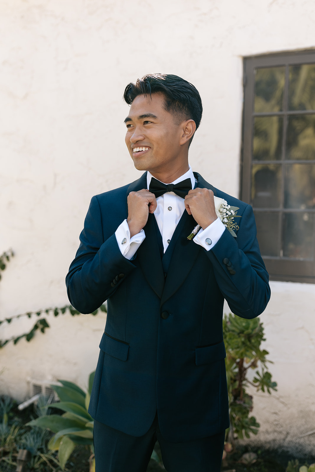 griffith house wedding anaheim california groom portraits groom suits groom bow tie 