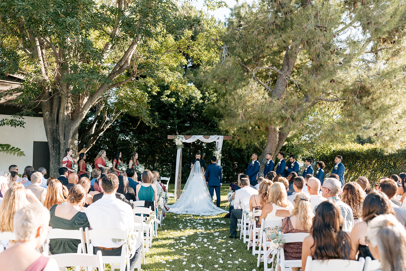 griffith house wedding anaheim california emotional ceremony ring exchanging sunny outdoor ceremony bride and groom