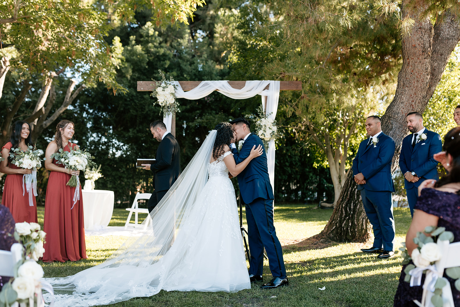 griffith house wedding anaheim california exchanging vows bride and groom kissing running down the aisle just married