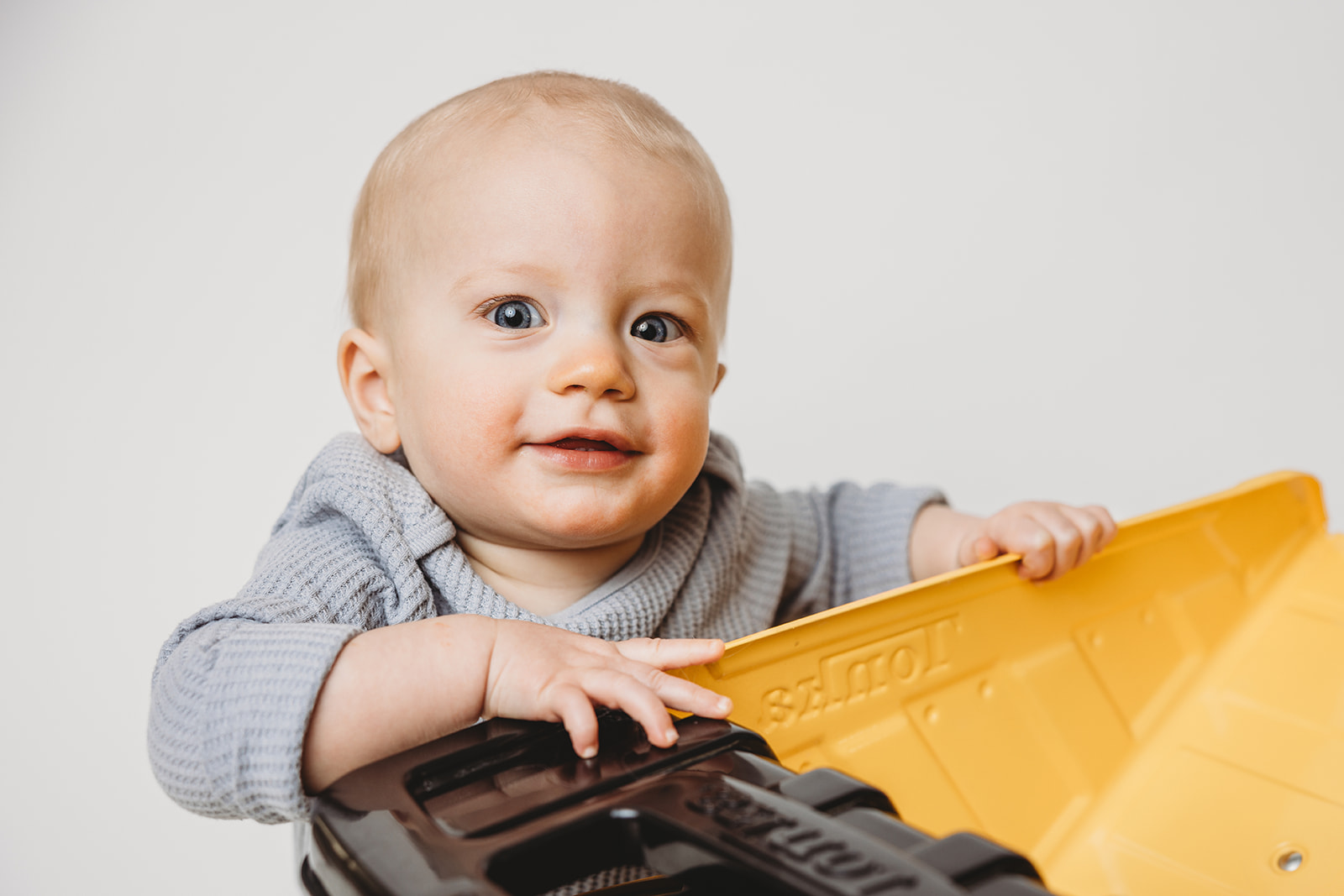 Reading Pennsylvania indoor studio photoshoot 10 month old baby boy sitter milestone portrait session