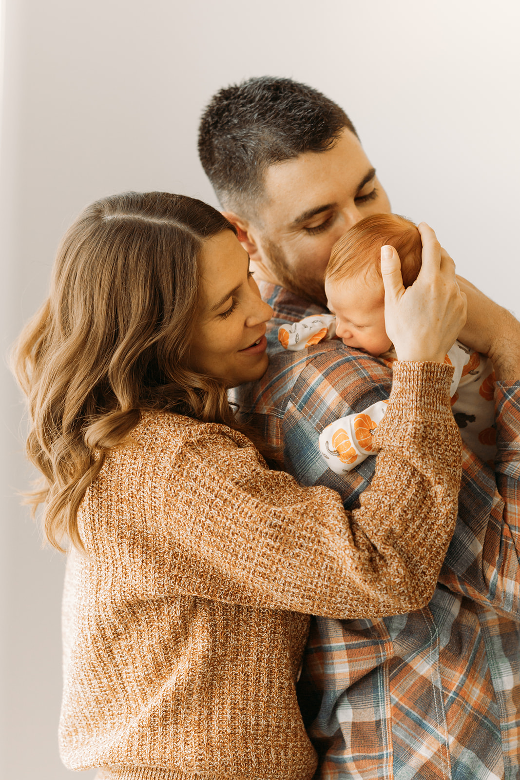 castle pines colorado newborn baby photographer with natural light in home | Halloween and Christmas