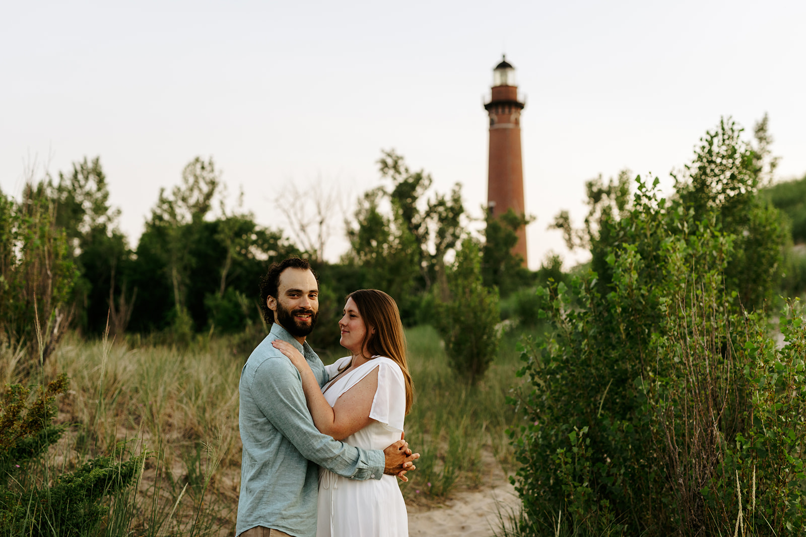 beach lighthouse engagement photos west michigan Brianna Kirk Photography