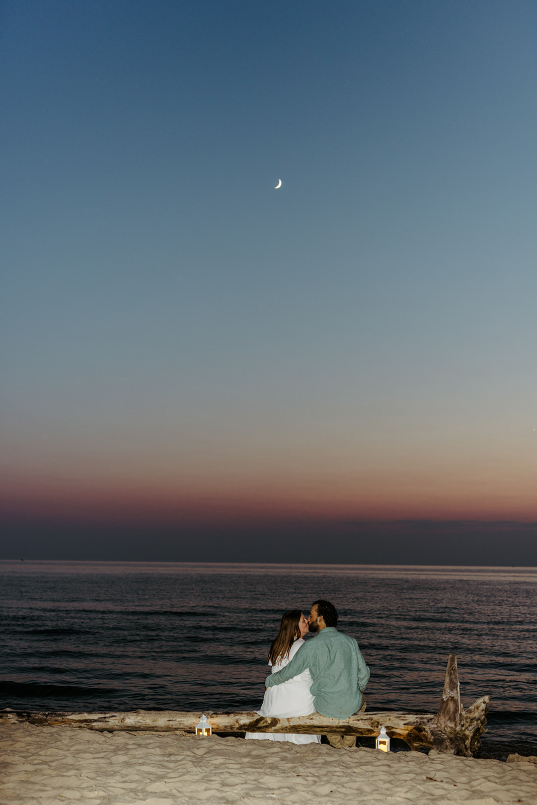 blue hour moody lantern beach engagement photos Brianna Kirk Photography