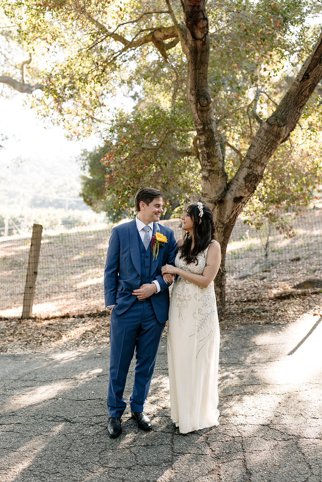 inn of the seventh ray wedding topanga california socal bridal portraits navy blue wedding suit sunflowers bright flower