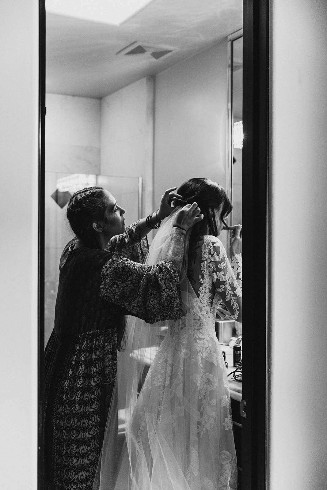 documentary bridal candid best friends getting ready in the bathroom Scottsdale arizona brianna kirk photography