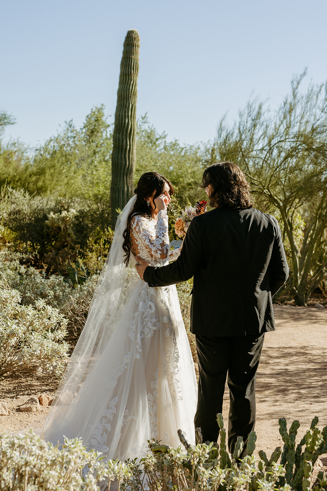 documentary editorial luxury desert wedding first look in the desert brianna kirk photography