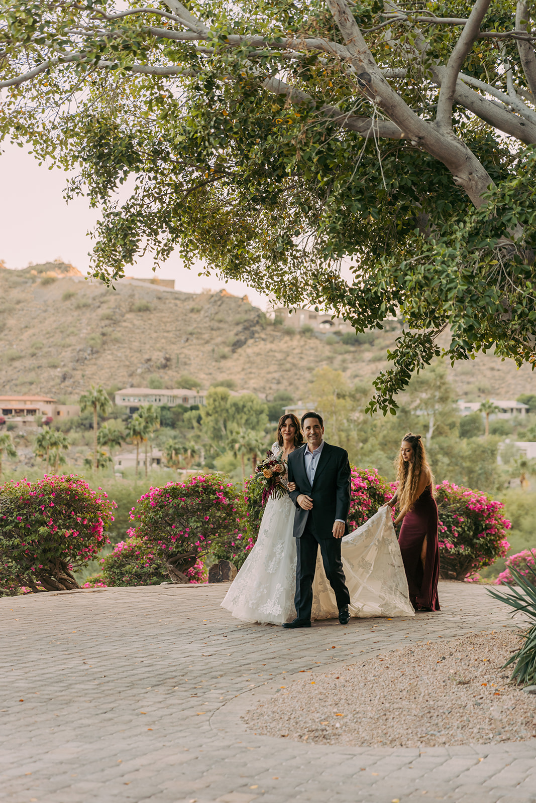 luxury backyard intimate wedding ceremony bride and father walking down the isle candid wedding brianna kirk photography