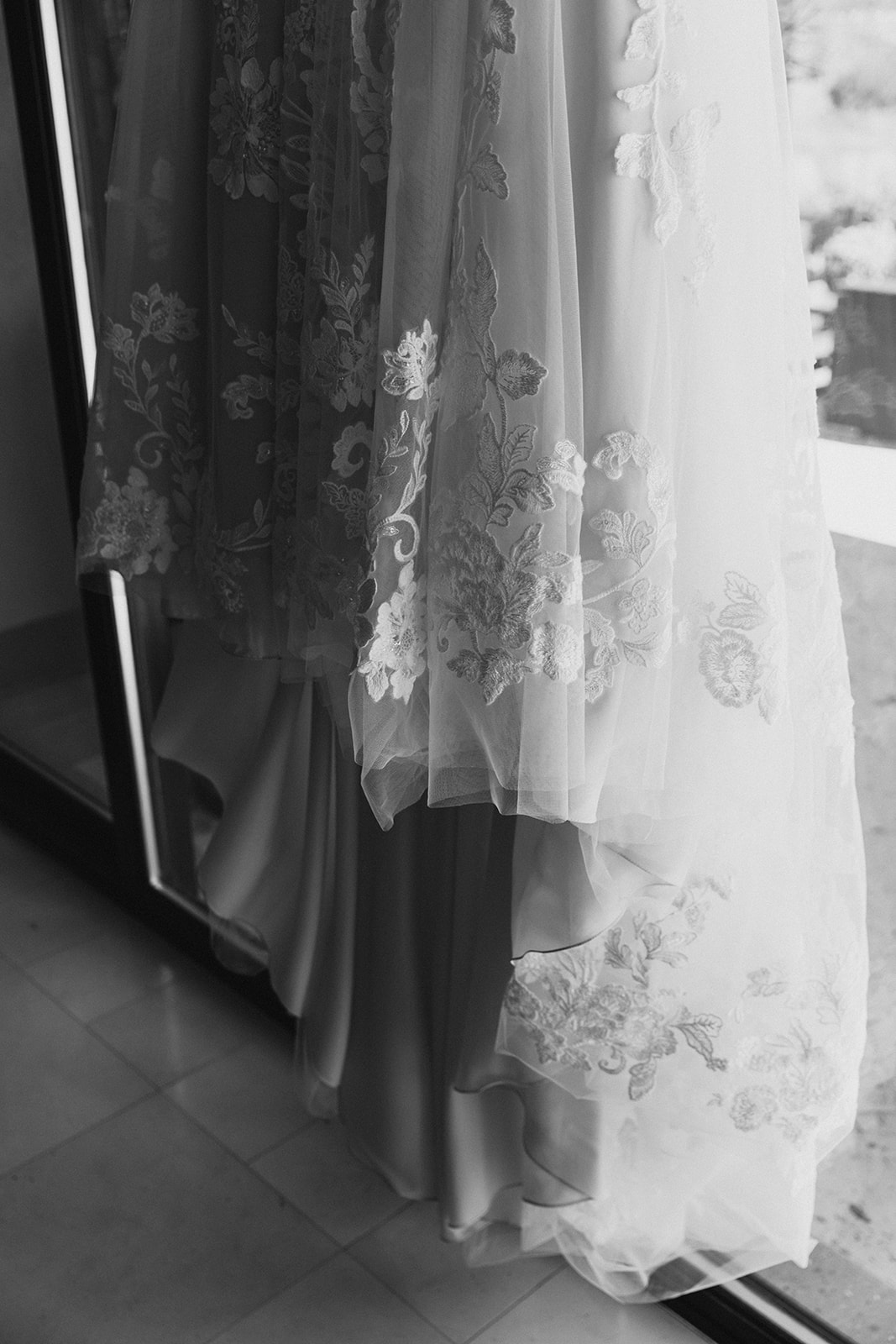luxury editorial wedding dress details in black and white brianna kirk photography