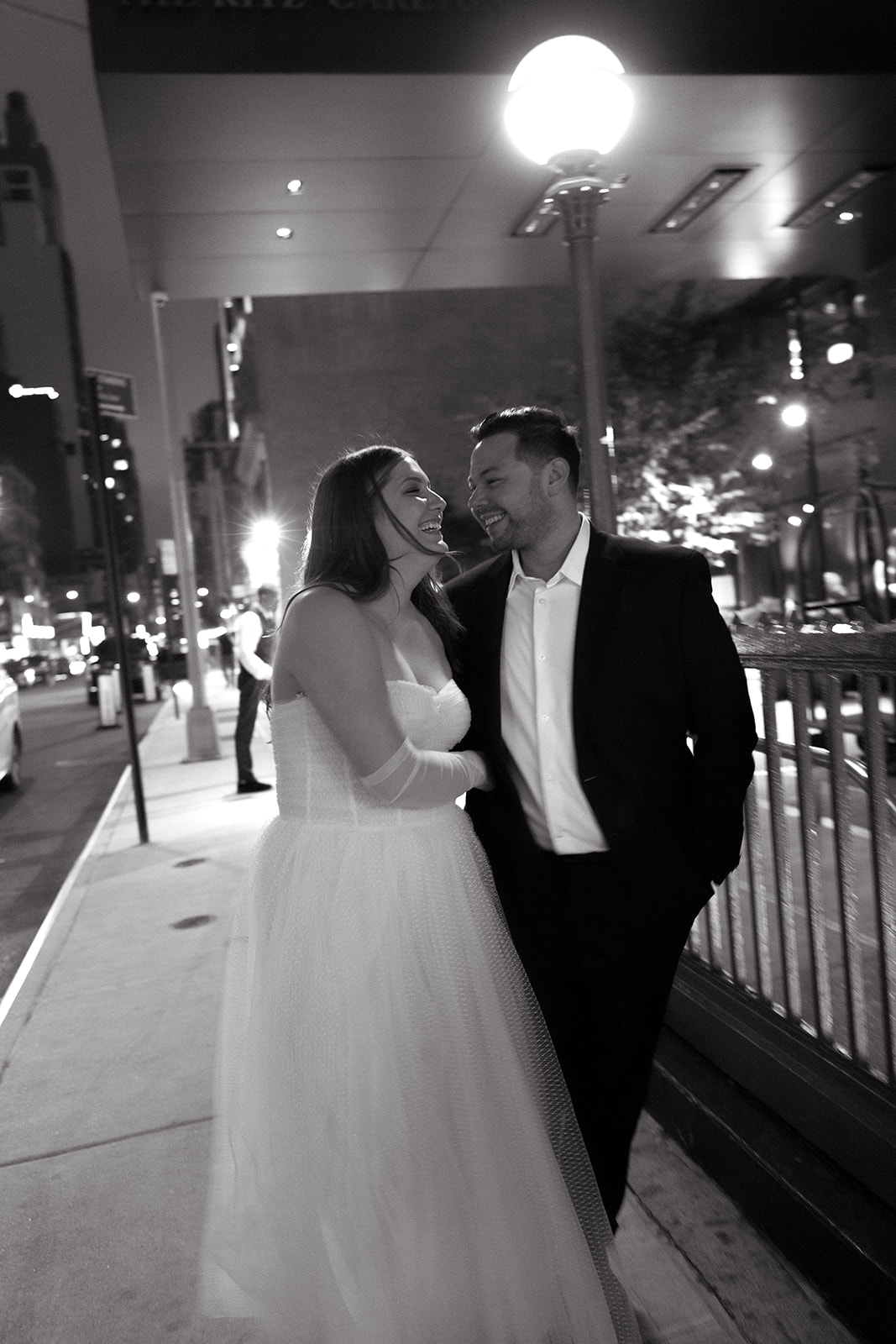 A couple who eloped in NYC walk around the streets at night