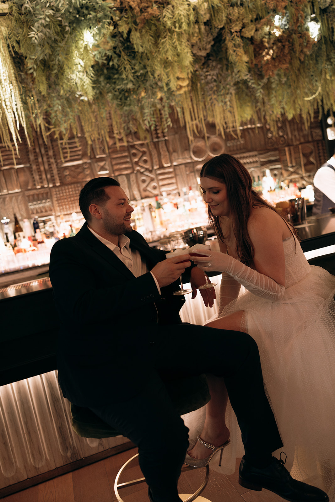 A couple who eloped in NYC go to a bar to share celebratory drinks