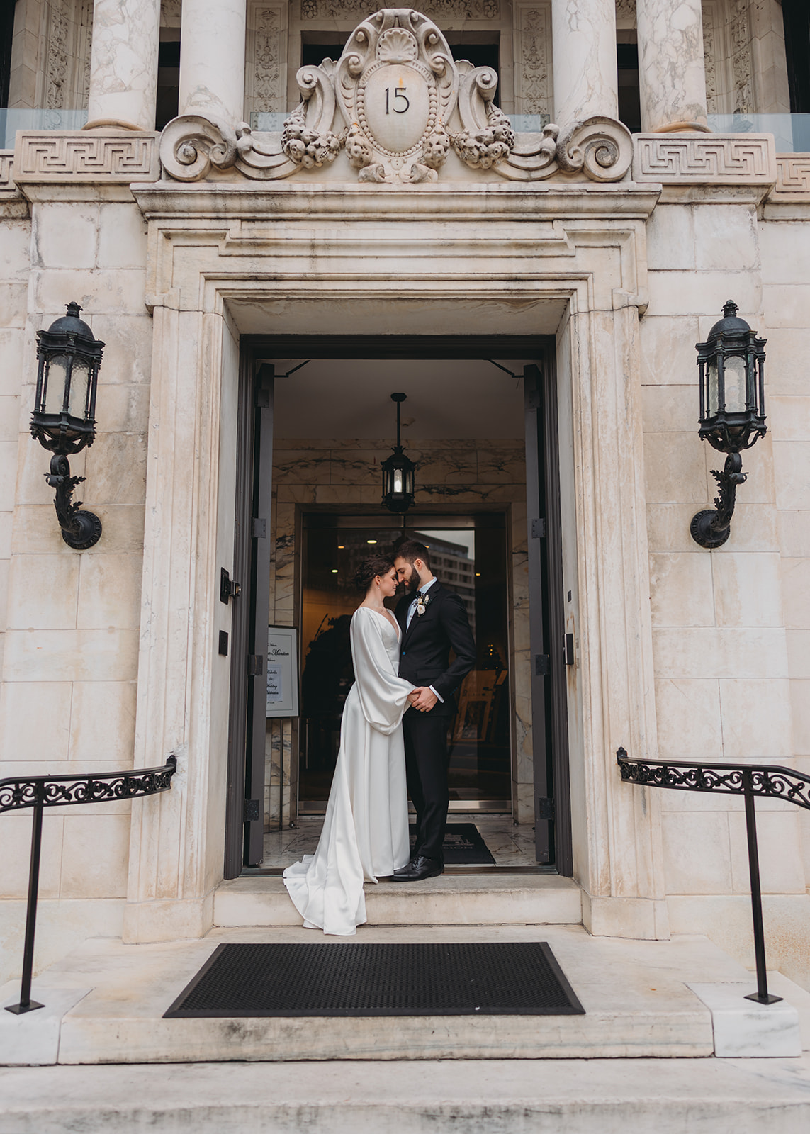 bride and groom embrace and hold one another at Patterson Mansion Wedding in Washington DC