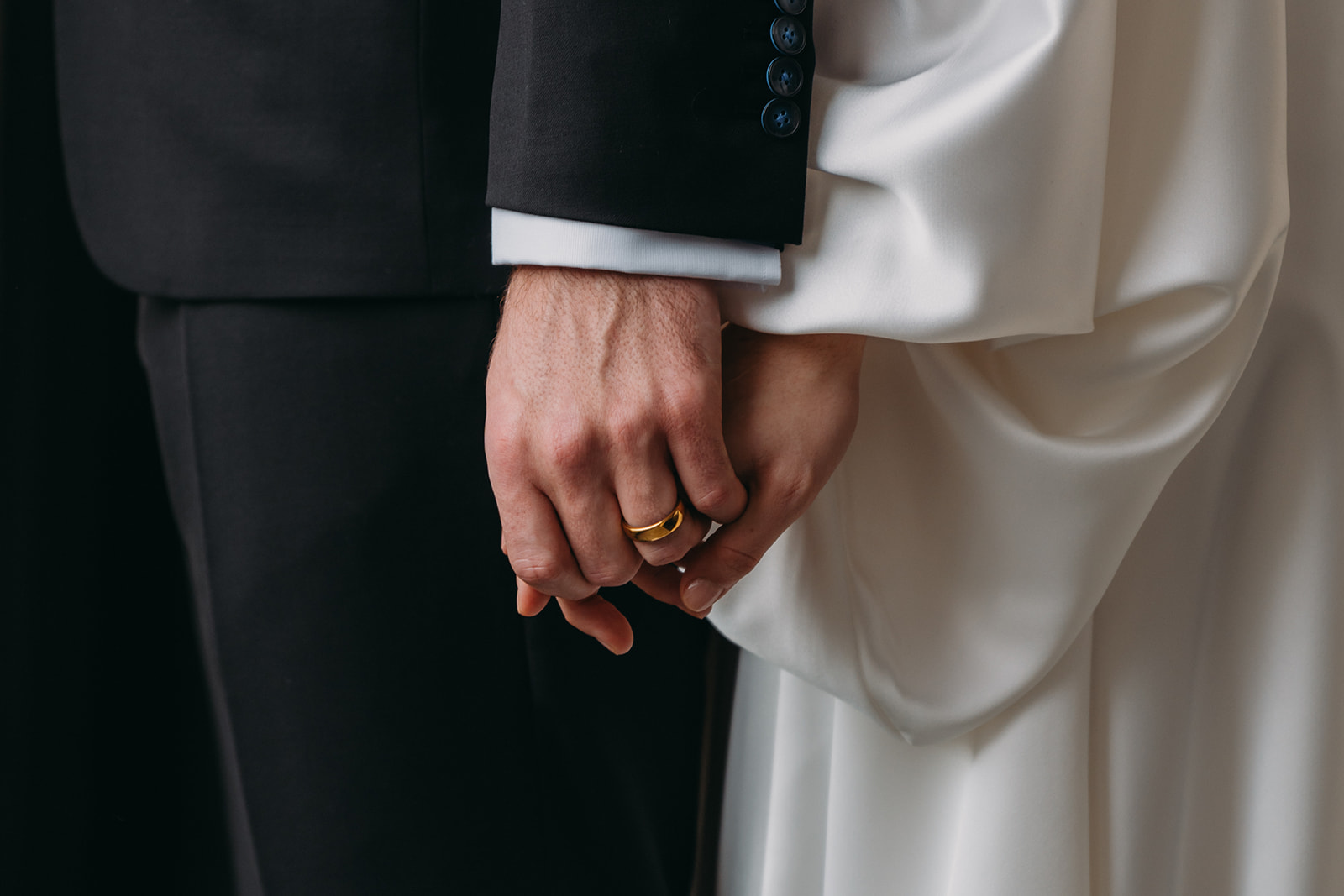 bride and groom hold hands at Patterson Mansion Wedding in Washington DC