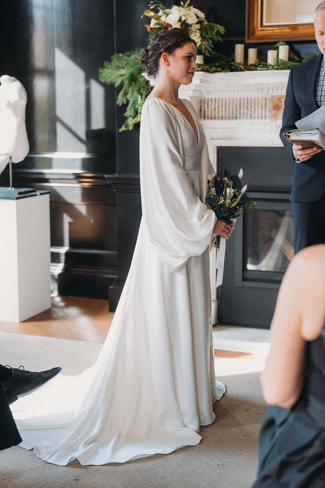 bride stands elegantly at Patterson Mansion Wedding in Washington DC