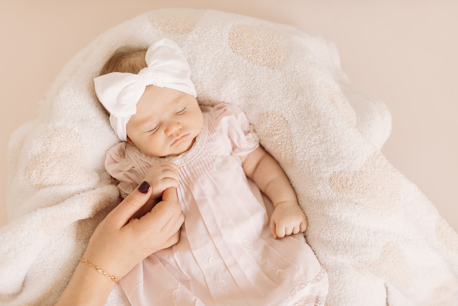 Denver Baby Girl Newborn Photos in Blush Pink Nursery near Cherry Hills