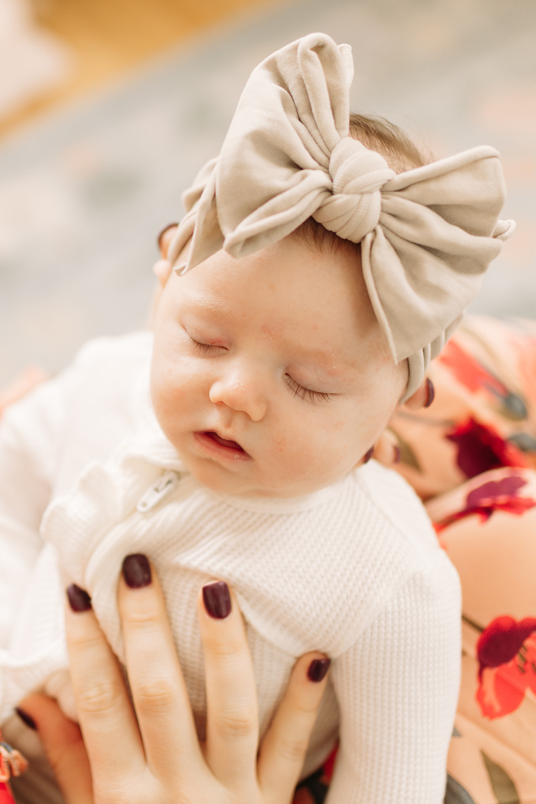 Denver Baby Girl Newborn Photos in Blush Pink Nursery with neutral color palette and big bow