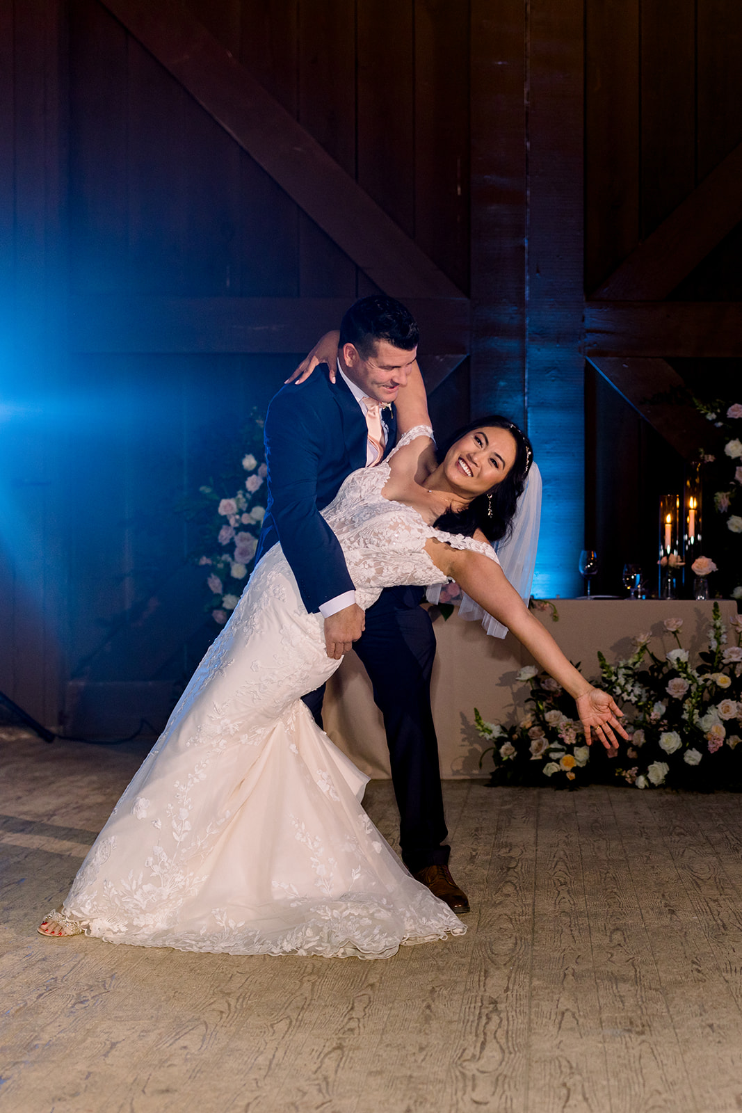 Rhoda's natural beauty shines as she twirls in her wedding gown, creating a moment of pure elegance.