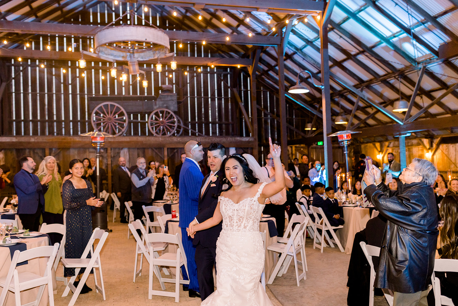 The dance floor comes alive with energy as the couple celebrates their union with family and friends