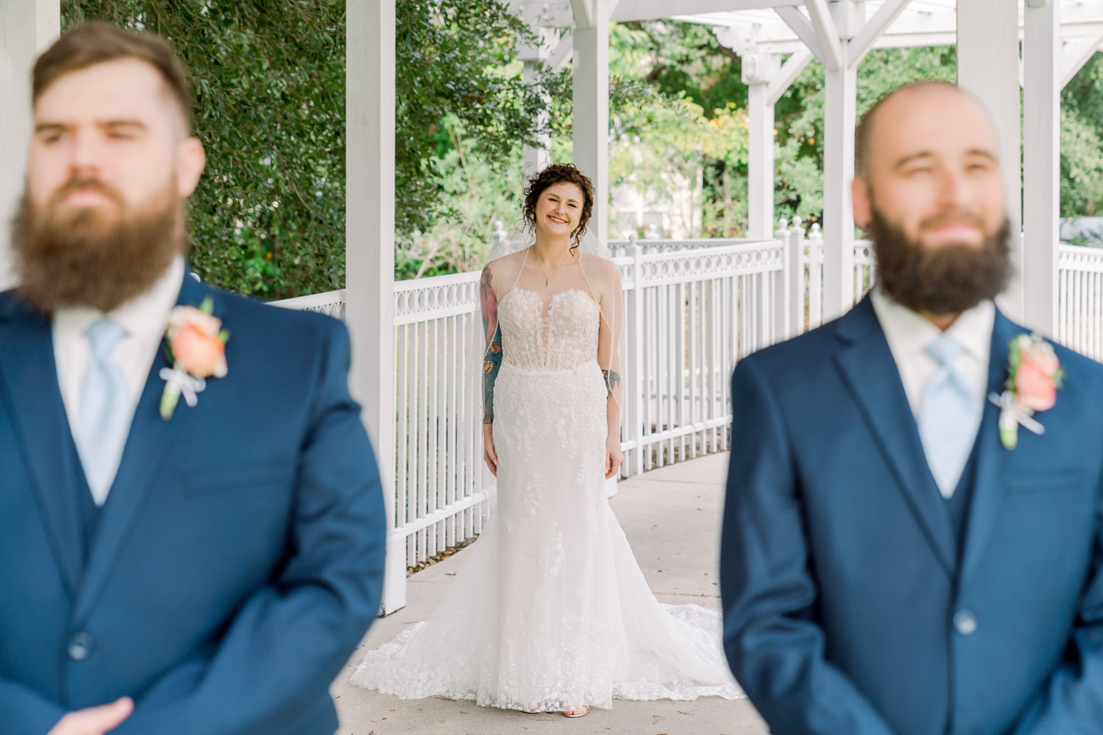 First look with bride and two groomsmen