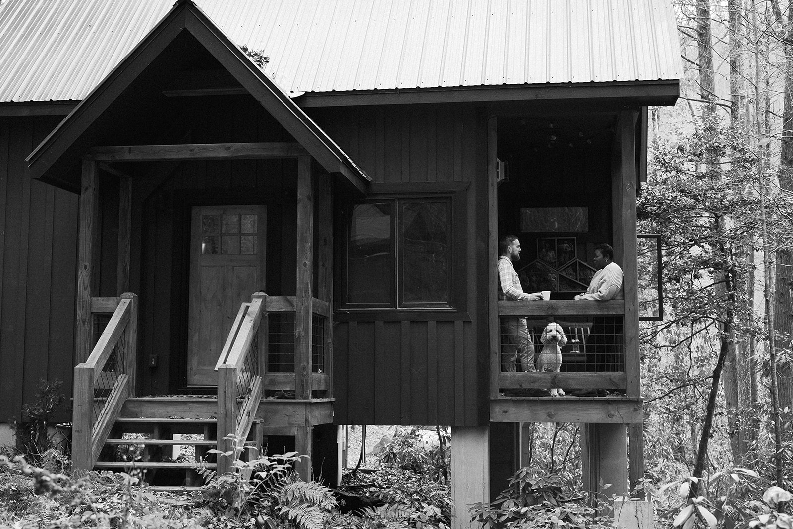 Couple on porch during cabin photoshoot