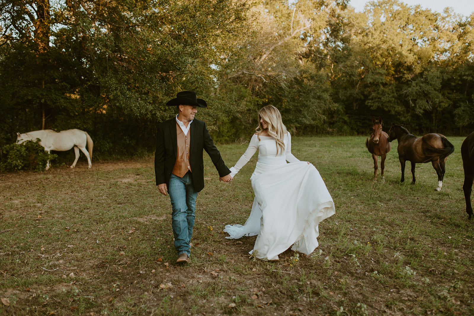 Couple portraits with horses during their backyard wedding in East Texas