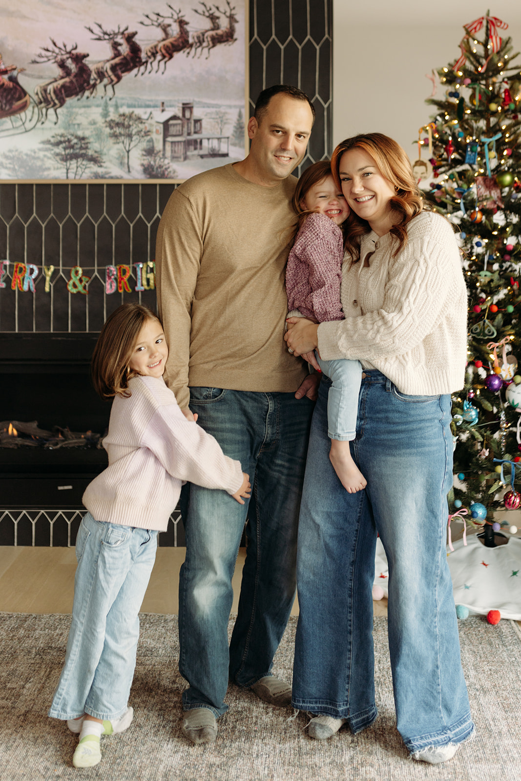 Interior Designers family photos at home for christmas in documentary style Colorado