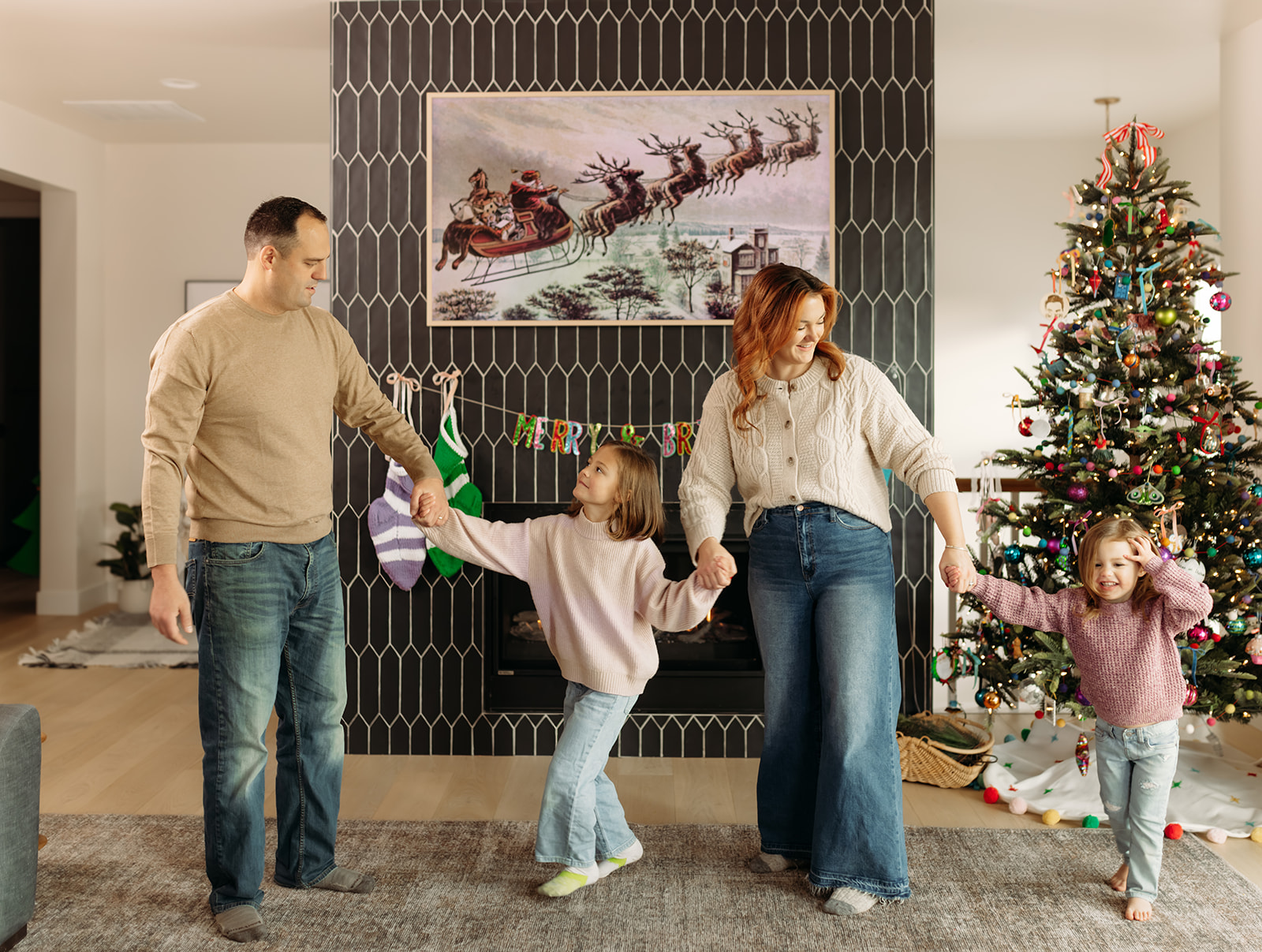 Interior Designers family photos at home for christmas in documentary style Colorado