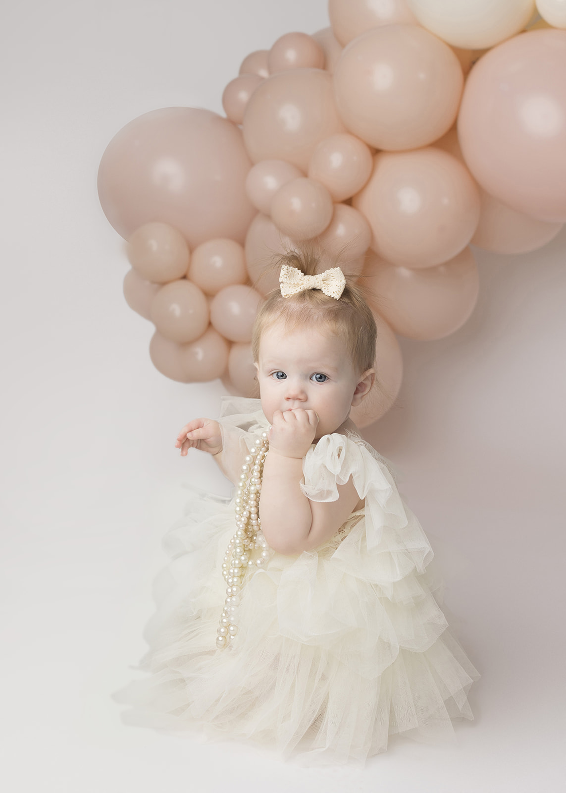 1st birthday girl cake smash photo shoot white dress