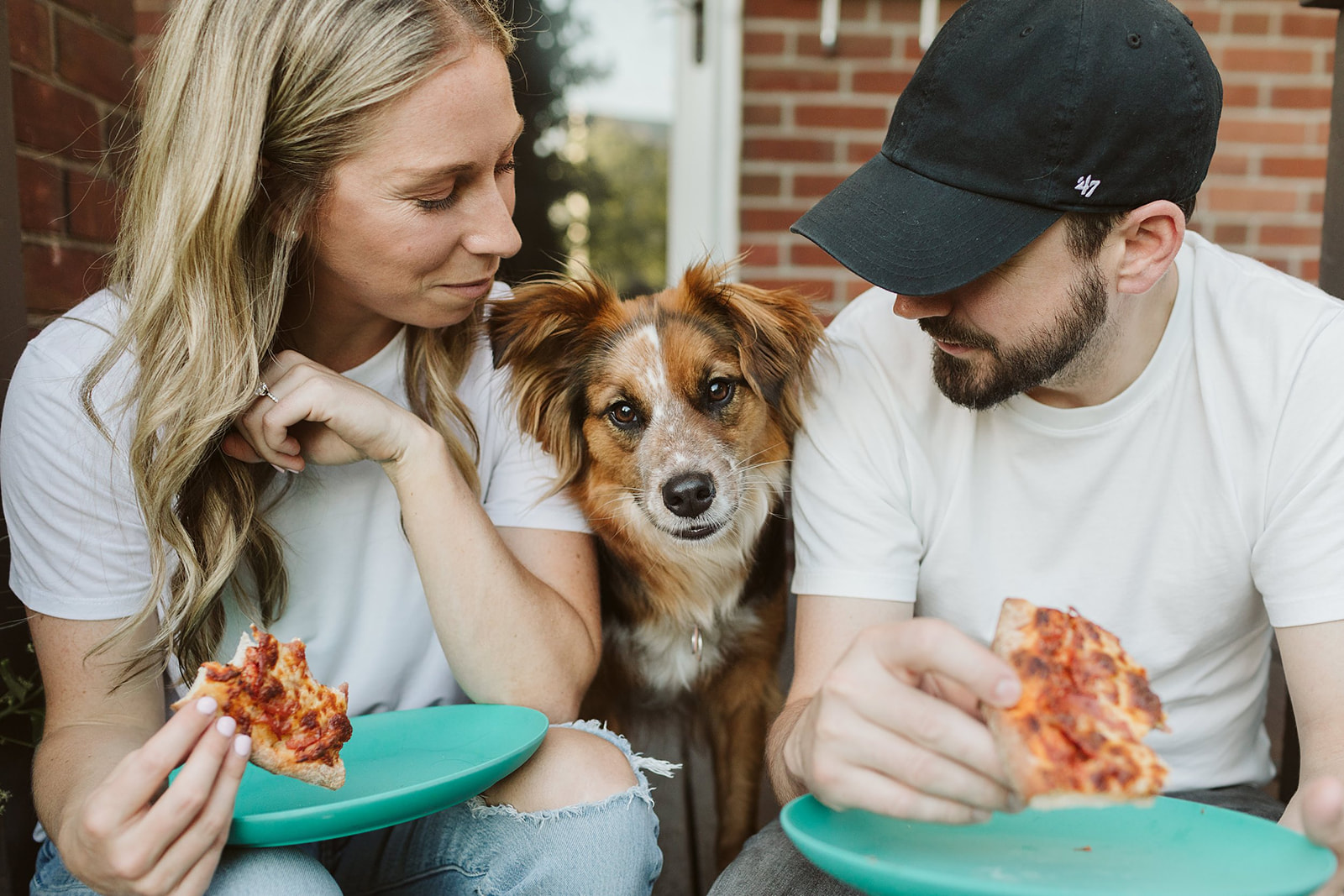 Pizza night for this couple who had their engagement session at home with their dog