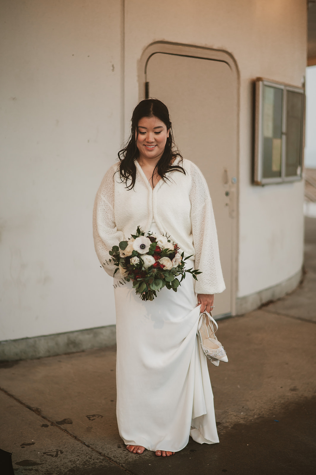 Intimate rainy day Chicago elopement wedding photography - barefoot bride in rain