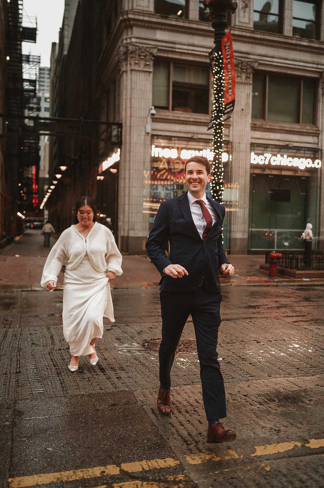 Intimate rainy day Chicago elopement wedding photography - walking through the alleys of Chicago