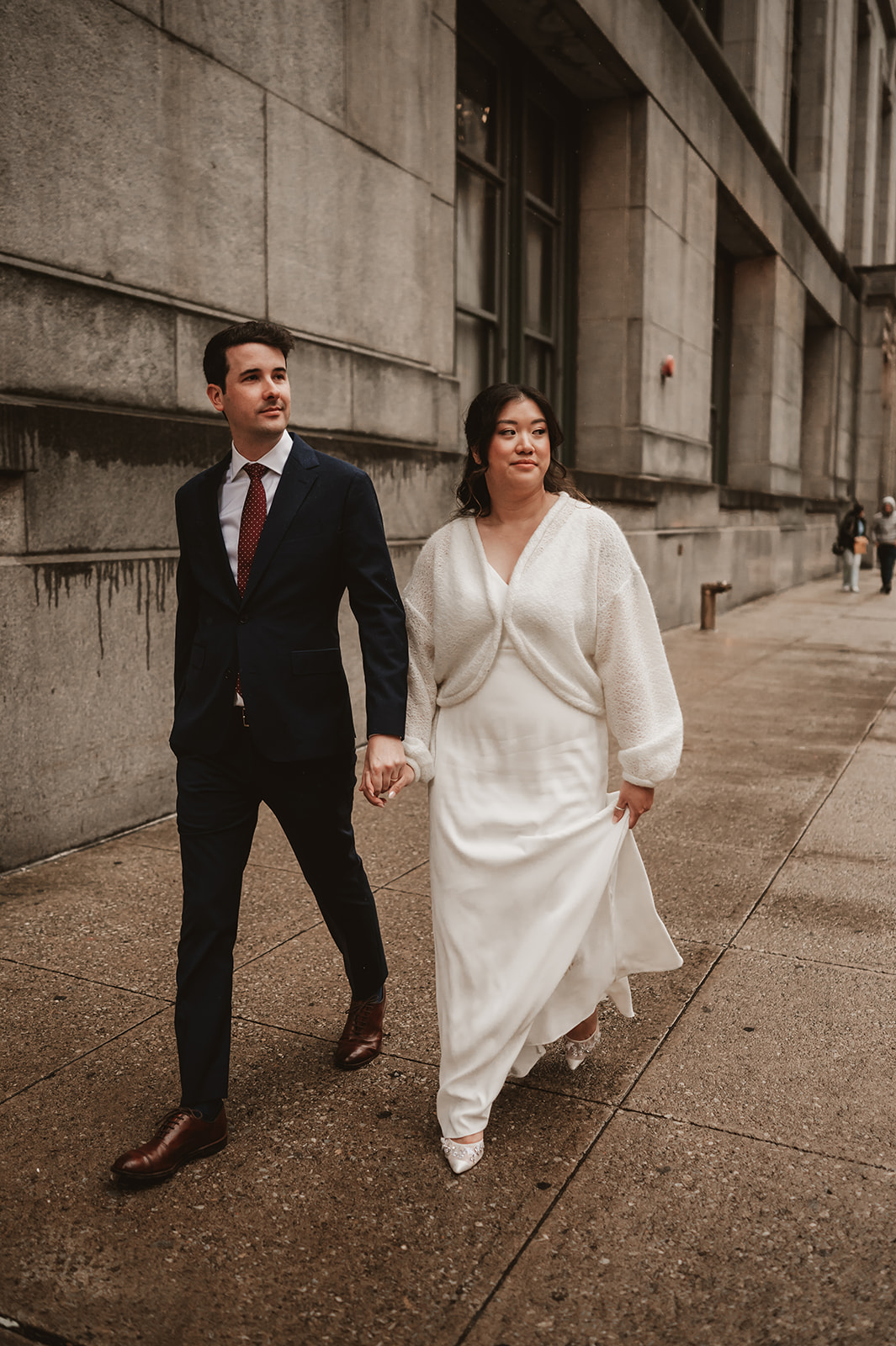 Intimate rainy day Chicago elopement wedding photography - walking through the streets of Chicago