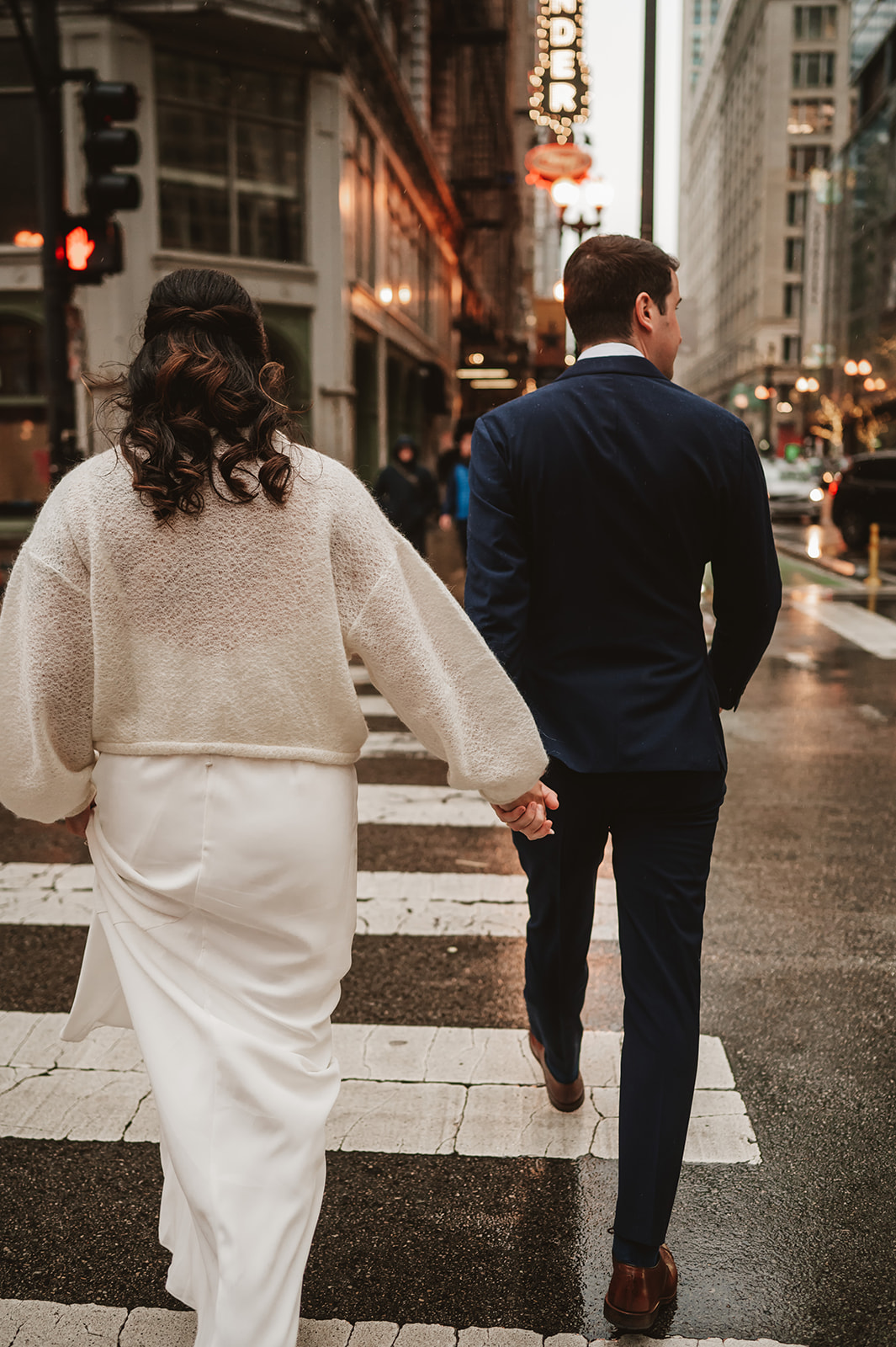 Intimate rainy day Chicago elopement wedding photography - walking through the streets of Chicago