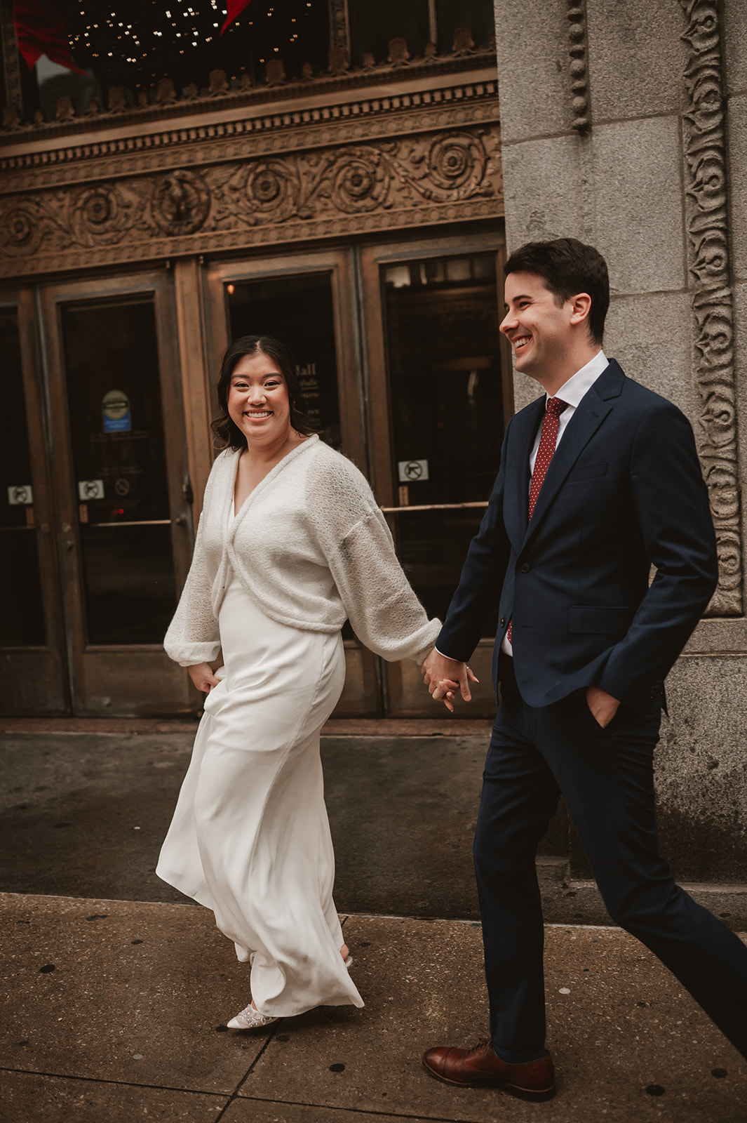 Intimate rainy day Chicago elopement wedding photography - Walking in