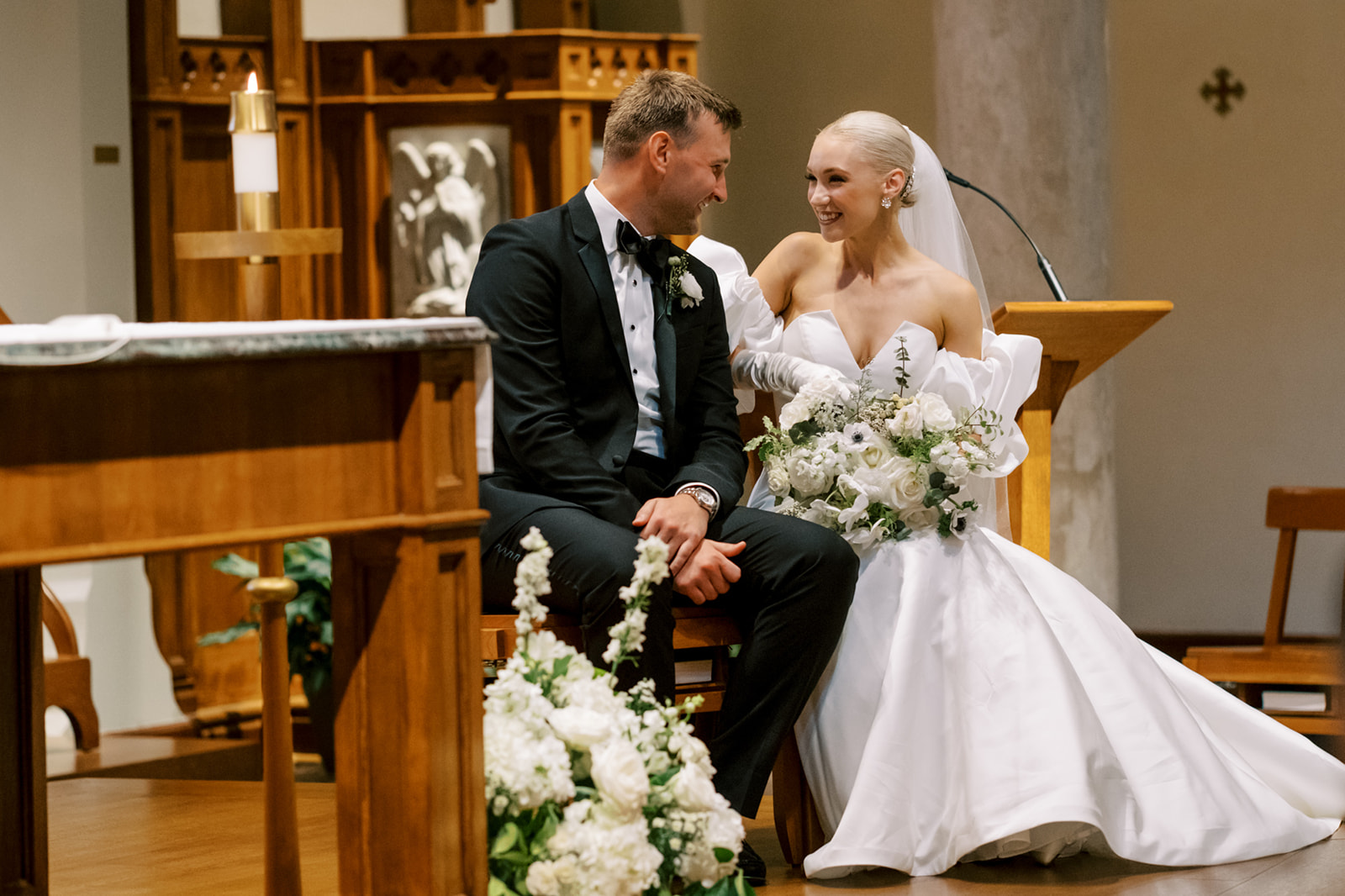Bride and groom share moment during Dahlgren Chapel wedding ceremony