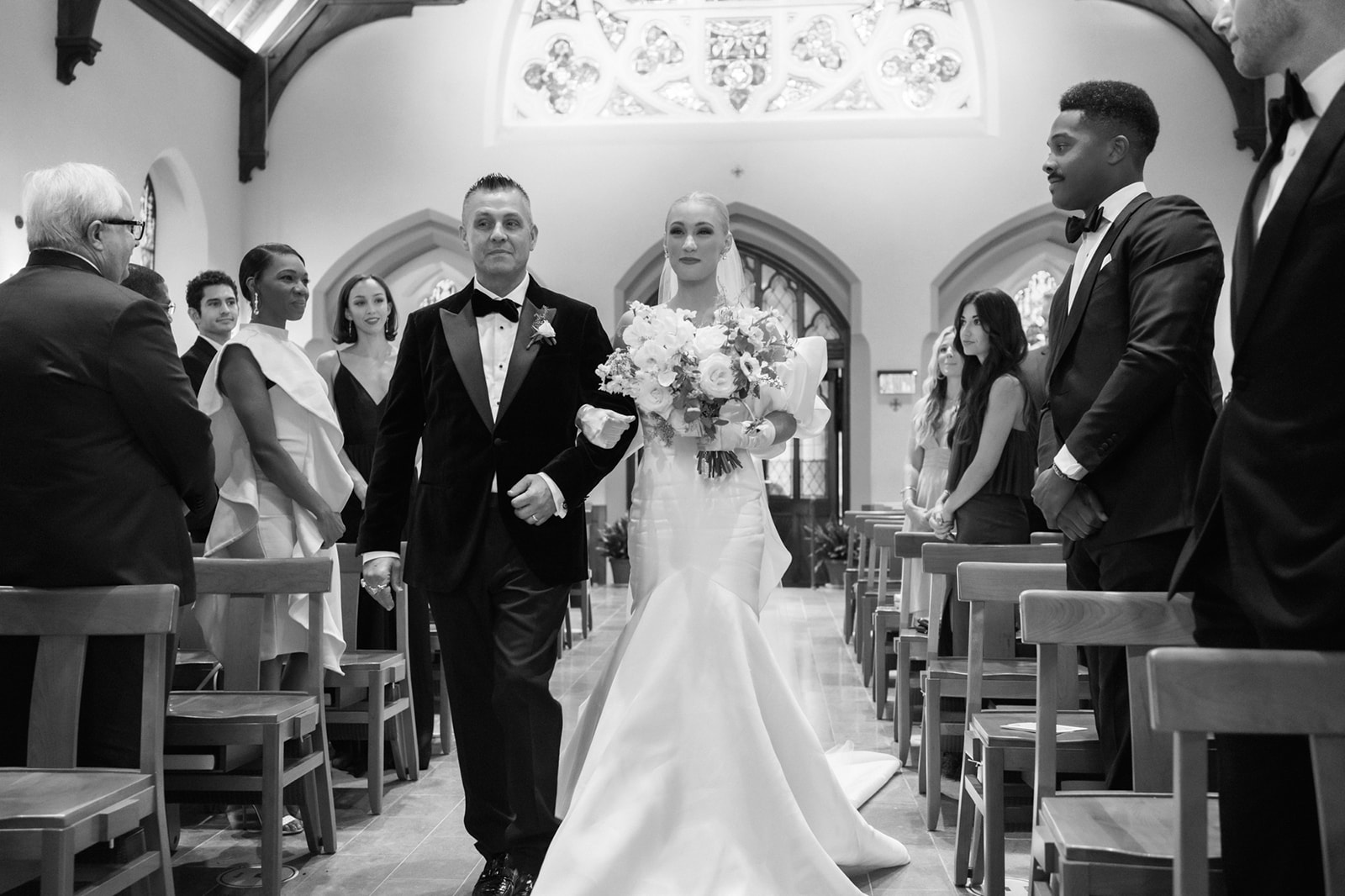 Bride and her Father walk down the aisle at Dahlgren Chapel in Georgetown University
