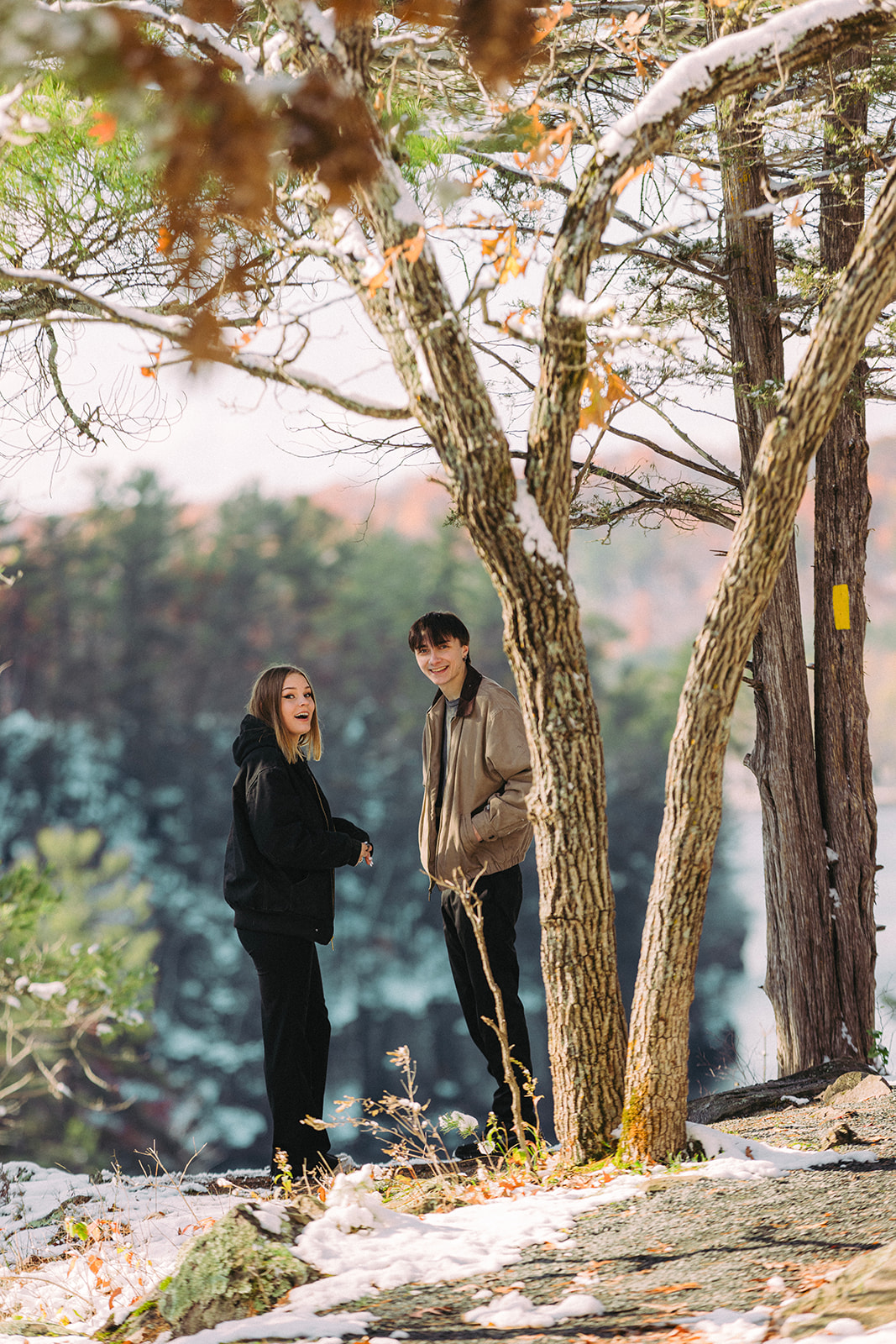 snowy fall nature surprise proposal at taylors falls documentary engagement 