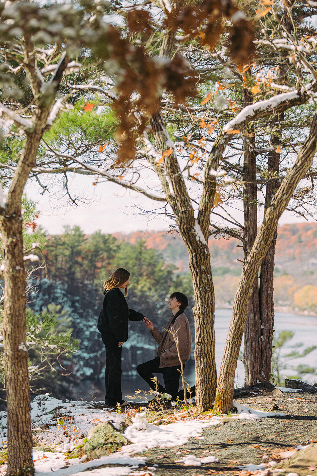 snowy fall nature surprise proposal at taylors falls documentary engagement 